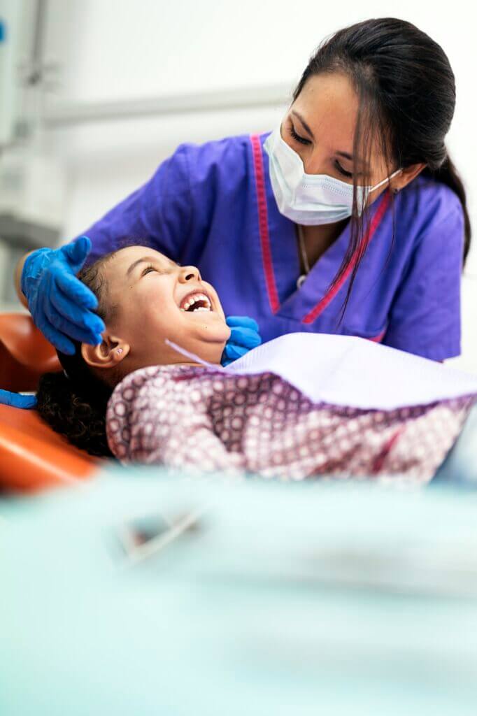 Dentist working in dental clinic
