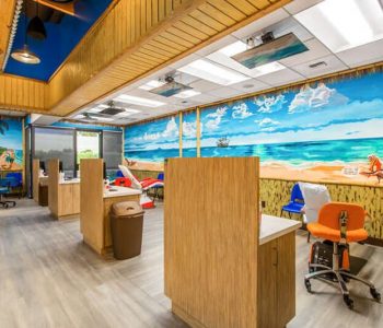 inside view of our dental offices with beautiful wall art
